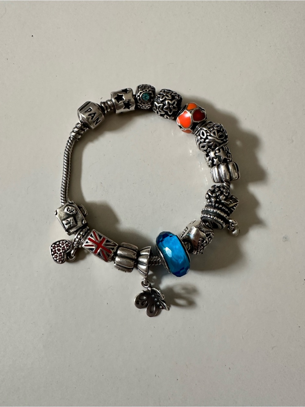 Pandora Silver Charm Bracelet with Blue Crystal & Orange Accents